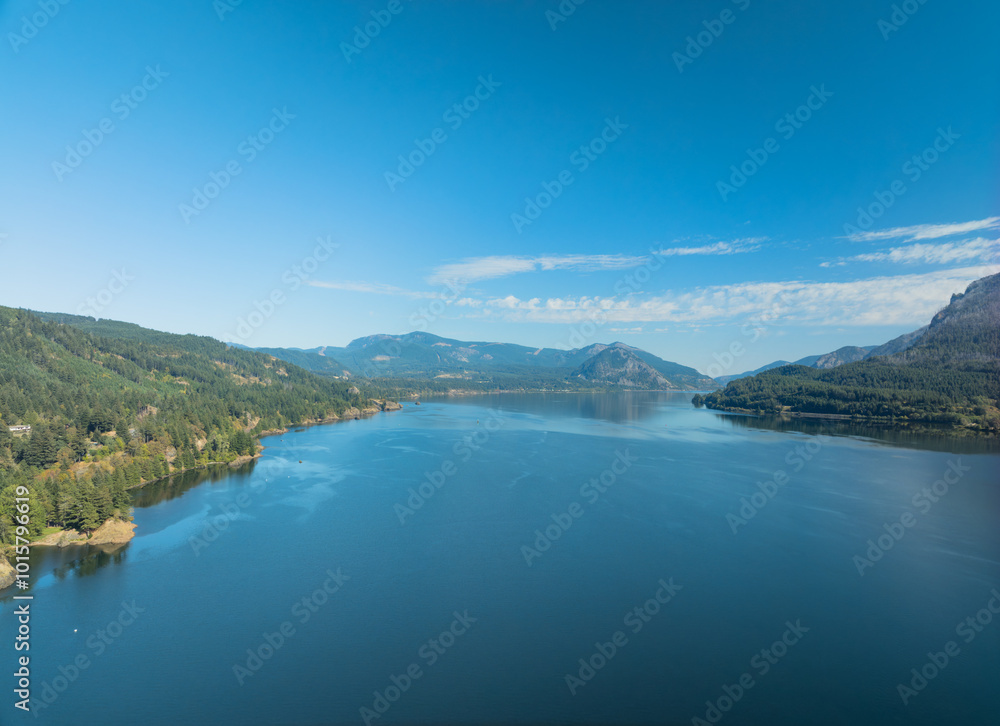 A beautiful lake with mountains in the background A beautiful lake with mountains in the background