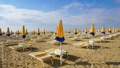 Fototapeta Naklejka Na Ścianę i Meble -  Umbrellas on the beach of Lido di Jesolo near Venice, Veneto region, Italy.