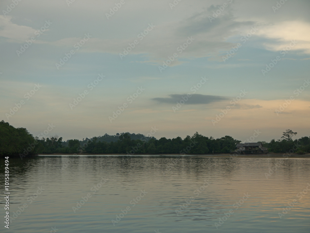 Sunset on the river with mangroves on Bintan island, Indonesia Sunset on the river with mangroves on Bintan island, Indonesia