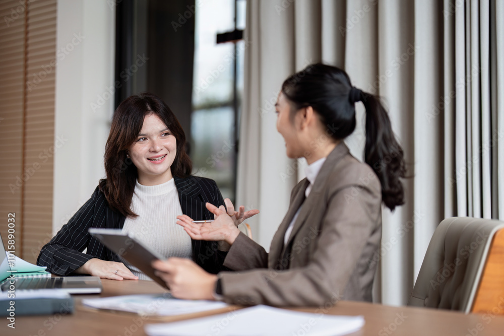 Business Team Engaged in Strategic Discussion in Office Environment Business Team Engaged in Strategic Discussion in Office Environment