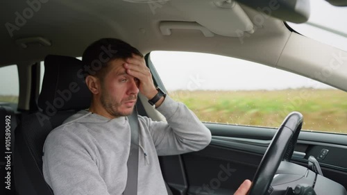 Tired man falling asleep while driving car on highway road. Sleepy male driver closes his eyes and lose concentration. Dangerous driving