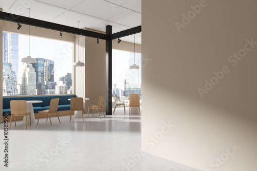 A modern cafe interior featuring large windows, tables, and chairs, with an empty wall for mockup. Urban cityscape in the background. 3D Rendering