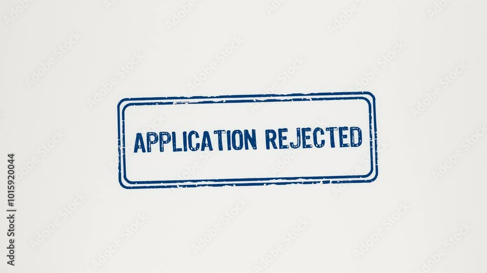 APPLICATION REJECTED - Animated wooden stamp pressing 'Application Rejected' onto white paper. APPLICATION REJECTED - Animated wooden stamp pressing 'Application Rejected' onto white paper.