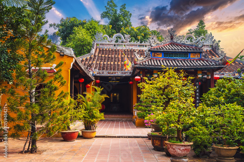 Beautiful Asian Buddhist temple on Vietnamese pagoda in the old town in Hoi An in Vietnam in Asia in summer