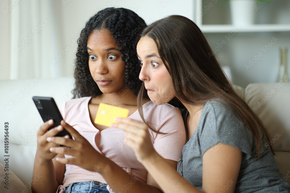 Perplexed interracial lesbian couple buying online Perplexed interracial lesbian couple buying online