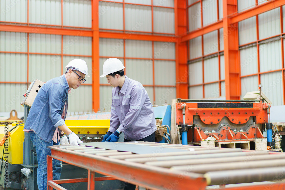 Industrial engineer team works together in factory. Industrial engineer team works together in factory.