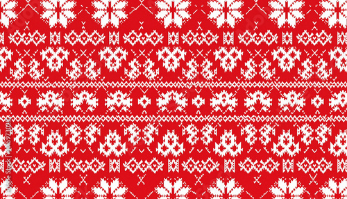 Red and white knitted pattern design featuring festive snowflakes and ornaments