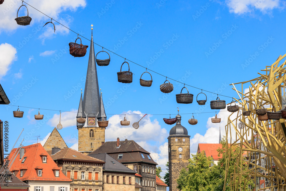 Obraz premium Historical old town of the district town Lichtenfels on a day with blue sky and cumulus clouds, Germany, Lichtenfels, 29.July.2023