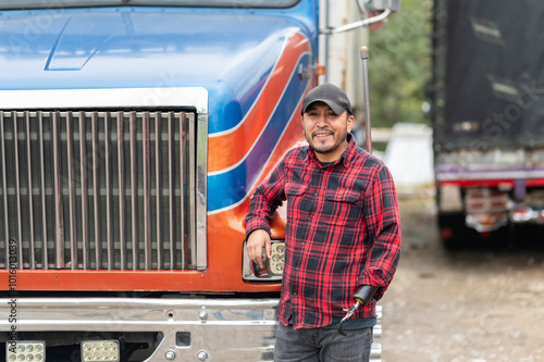 Portrait of truck driver with prosthetic arm outside truck