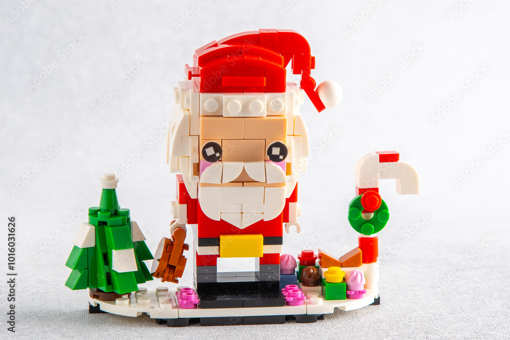 Fototapeta premium Christmas tree toy. Lego constructor from mini bricks. Children's craft. Game. Ukraine, Kyiv - January 17, 2024