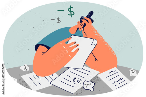 Unhappy man distressed with debt paperwork