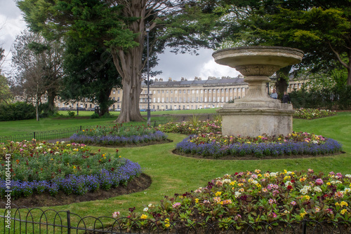 A view through Royal Victoria Park to the The Royal Crescent, a row of thirty terraced houses in the city of Bath,