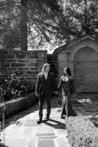 This engagement photoshoot showcases a beautiful diverse couple in love, emphasizing their unique bond and the joyful celebration of their upcoming proposal and commitment journey