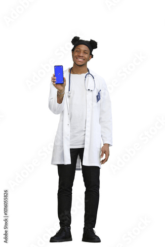 The doctor, in full height, on a white background, shows the phone