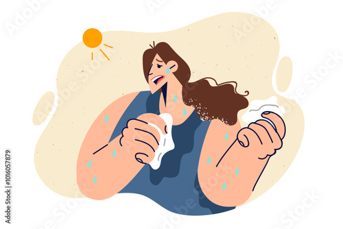 Woman suffers from heat causing exhaustion and sunstroke, breaking out in sweat due to bright sun