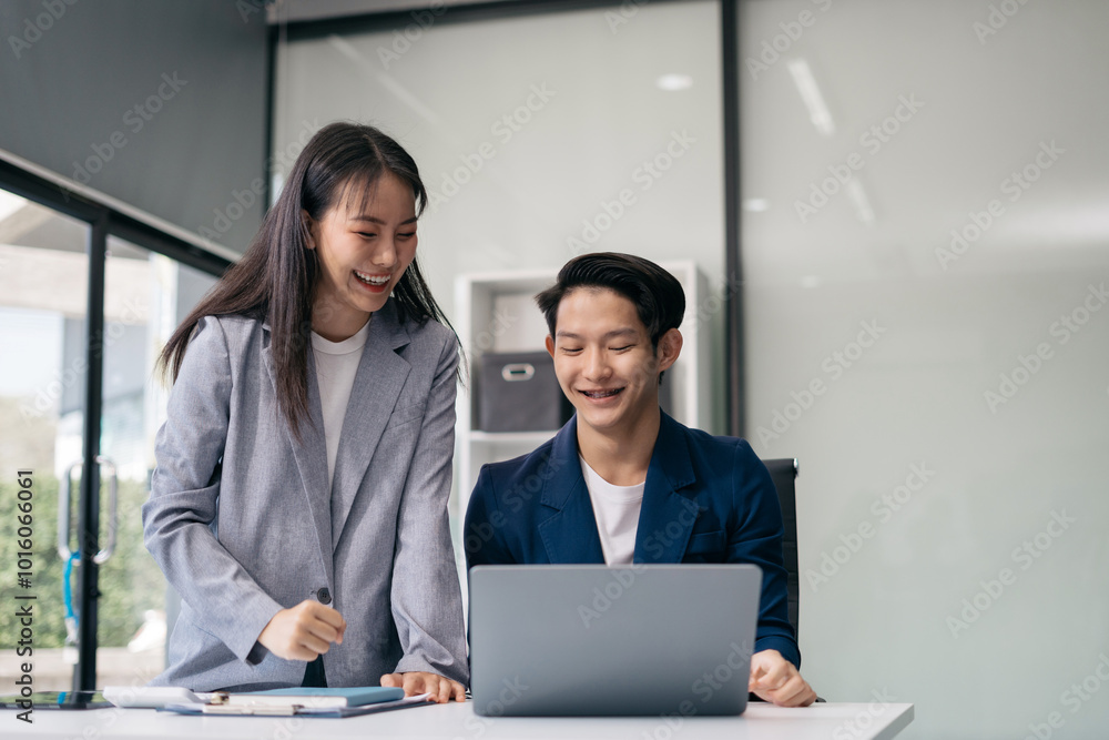 Happy smiling businessman feel happy work complete Teamwork success, success at work in the office concept. Happy smiling businessman feel happy work complete Teamwork success, success at work in the office concept.