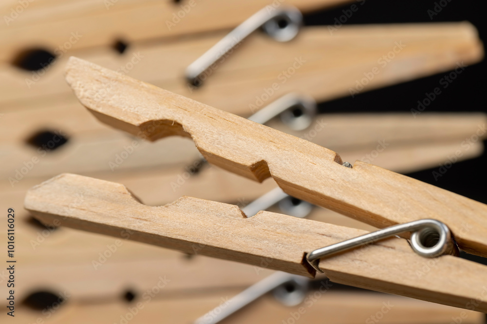a group of wooden clothespins for drying clothes a group of wooden clothespins for drying clothes