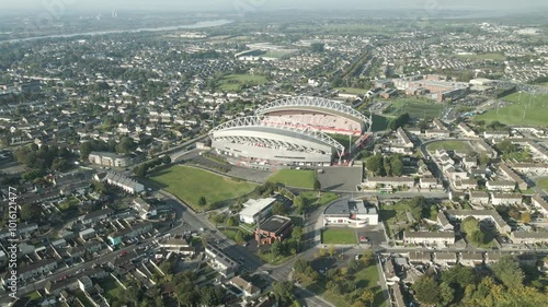 Thomond park stadium in limerick surrounded by residential and city landscape, aerial view photo