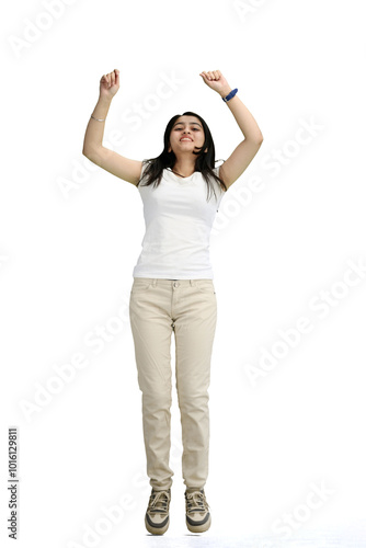 A woman, full-length, on a white background, jumps