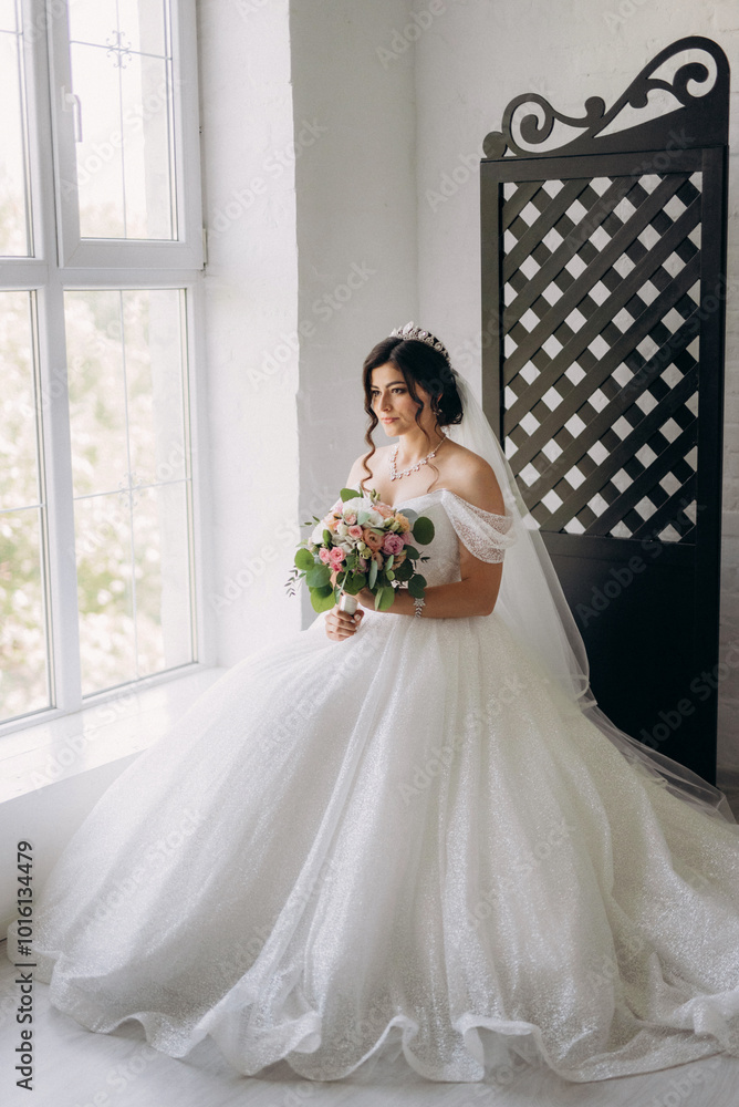 black-haired bride girl getting ready for groom in boudoir black-haired bride girl getting ready for groom in boudoir