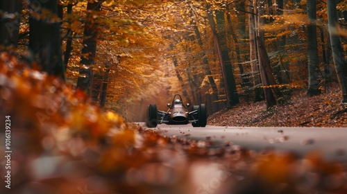 A classic race car drives through a vibrant, autumnal forest, immersed in golden hues, evoking the exhilaration of racing in a natural setting.