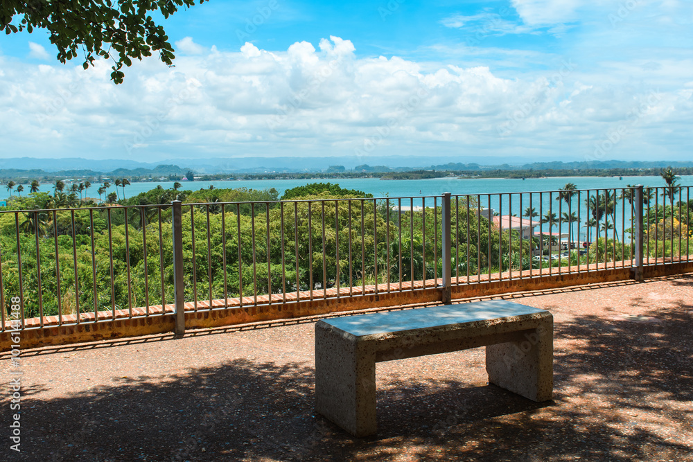 Obraz premium Serene Outlook in San Juan. A tranquil viewpoint overlooking tropical scenery.