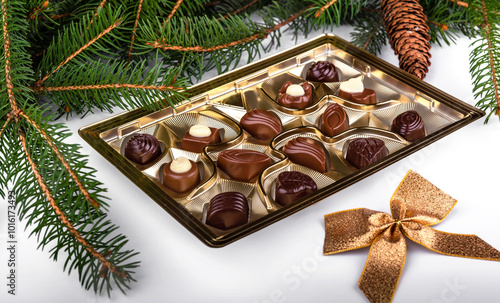 Box of chocolates and christmas decoration