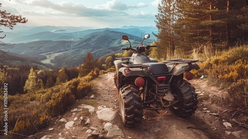 Off-Road ATV on a Mountain Path with Scenic Background photo