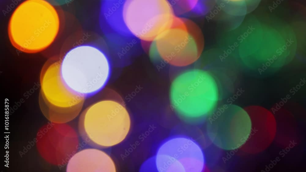 Colorful Bokeh from Shiny Tinsel Garlands, Christmas Bokeh Background Colorful Bokeh from Shiny Tinsel Garlands, Christmas Bokeh Background