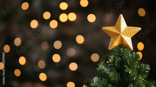 Glowing Christmas tree with golden lights and a star topper, blurred warm background for a festive holiday mood 