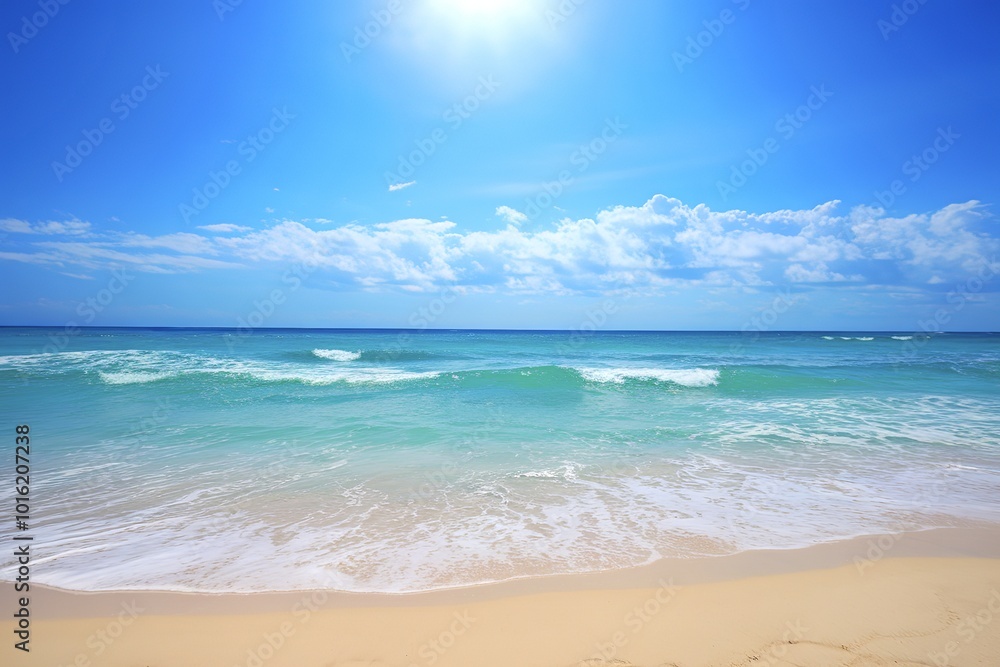 A pristine beach with golden sand leading up to the azure waters of the ocean A pristine beach with golden sand leading up to the azure waters of the ocean