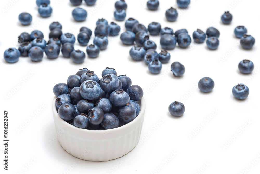 Fresh blueberries in a bowl on white background. Wild berries. Healthy eating Fresh blueberries in a bowl on white background. Wild berries. Healthy eating