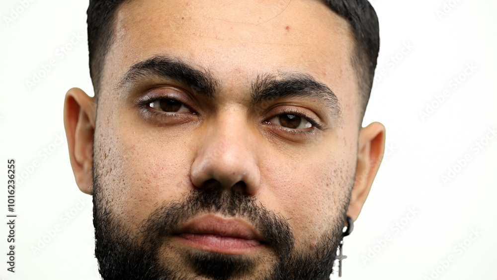 Fototapeta premium Man's face, close-up, on a white background