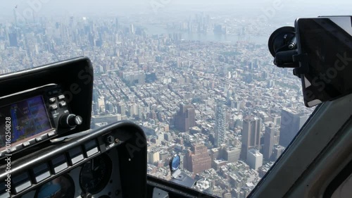 New York City helicopter cabin flight, heli cockpit flying over Manhattan, United States. World Trade Center tower, Downtown, Tribeca. Extreme tourism, travel USA. Camera shaking. Control panel.