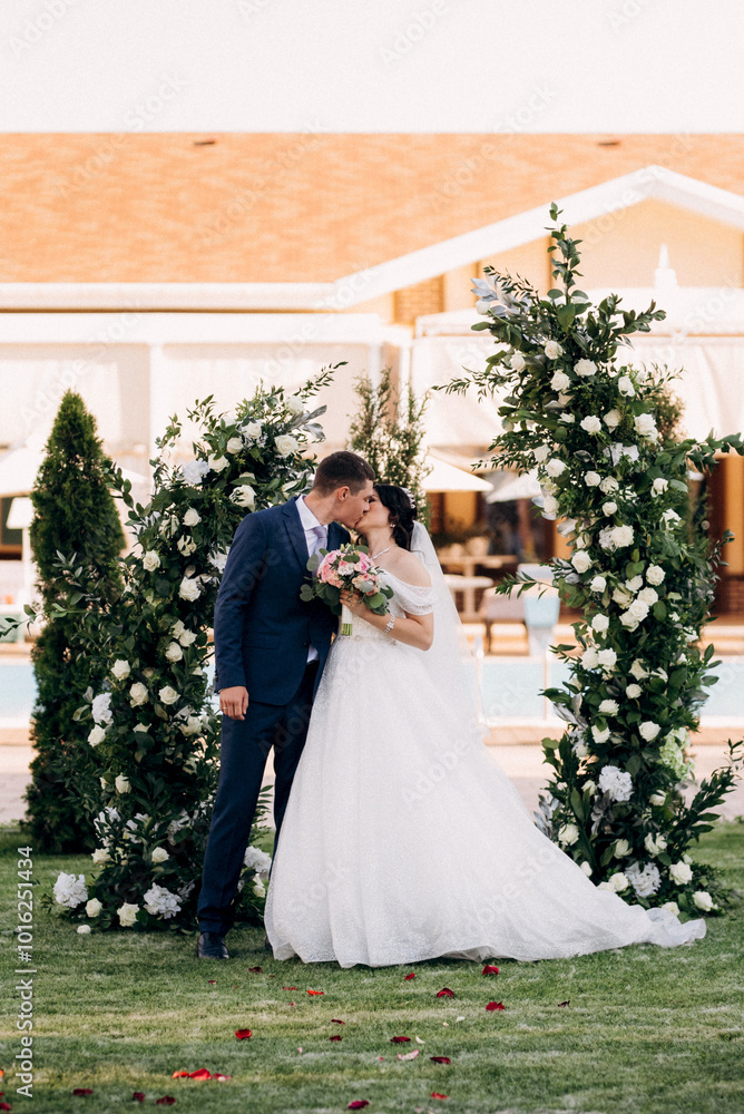 Fototapeta premium wedding ceremony of the newlyweds on the glade
