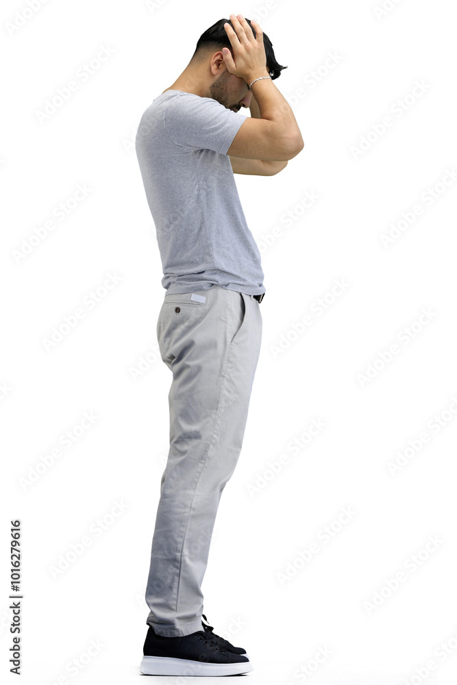 A man, full-length, on a white background, clutched his head A man, full-length, on a white background, clutched his head