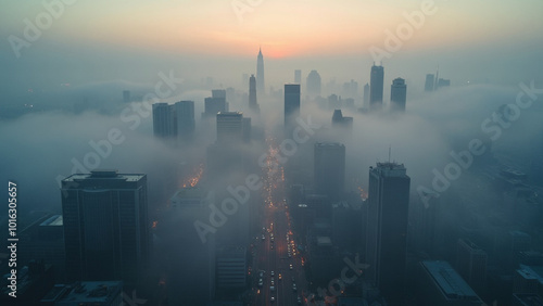 Aerial view of Heavy fog in the city. Top View of the foggy city with skyscrapers.