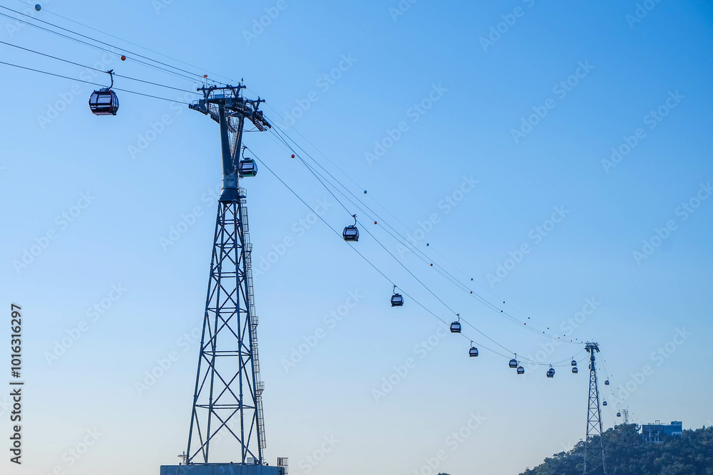 Beautiful landscape of cable car transportation system for tourist traveling at songdo beach, this place is one of the famous tourist destination in Busan, South Korea Beautiful landscape of cable car transportation system for tourist traveling at songdo beach, this place is one of the famous tourist destination in Busan, South Korea