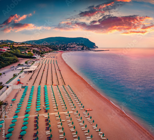 Fototapeta Naklejka Na Ścianę i Meble -  Astonishingl summer sunrise in Numana public beach. Exciting morning seascape of Adriatic sea. Nice outdoor scene of Italy, Europe. Traveling concept background.