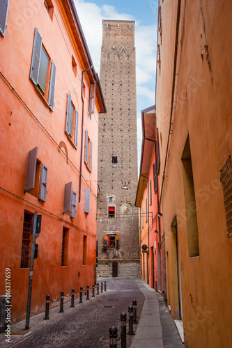 Prendiparte Tower in maze of medieval streets and lenes of Bologna, Italy photo