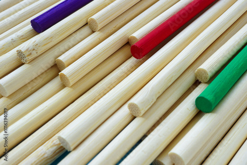 Photography Identical sticks and few colorful ones