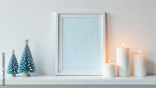 gentle blue photogram with white background stands on white wooden shelf, minimalist elegant christmas decoration, candles, beautiful christmas toys