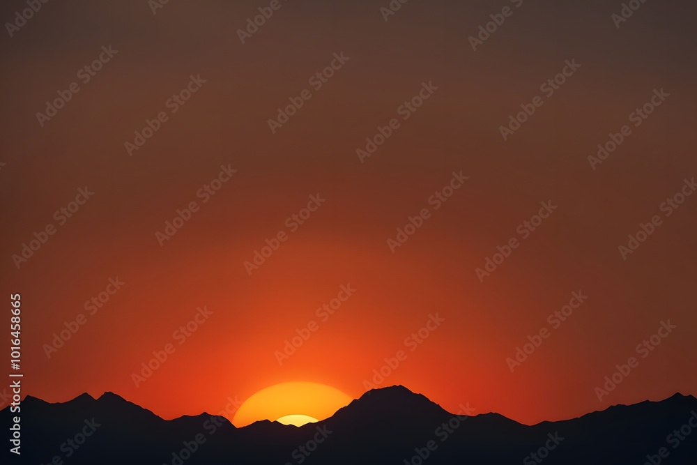 Silhouetted mountains at dusk with a bright orange sun dipping below the horizon, AI Generated