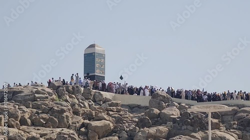 Mecca, Saudi Arabia on February 26, 2024. Jabal Rahmah in Arafah is the place where the Prophets Adam and Eve met after they were expelled from heaven.  This is the place where they ask for forgivenes photo