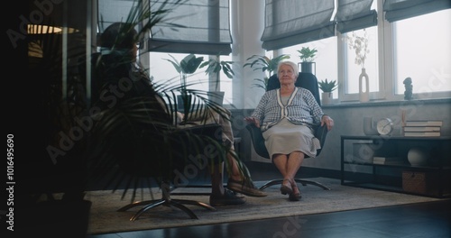 Wallpaper Mural Senior woman in psychotherapist's office. Old female patient and therapist talks about mental disorders, discusses family problems sitting in chairs. Psychology. Mental health care for older adults. Torontodigital.ca