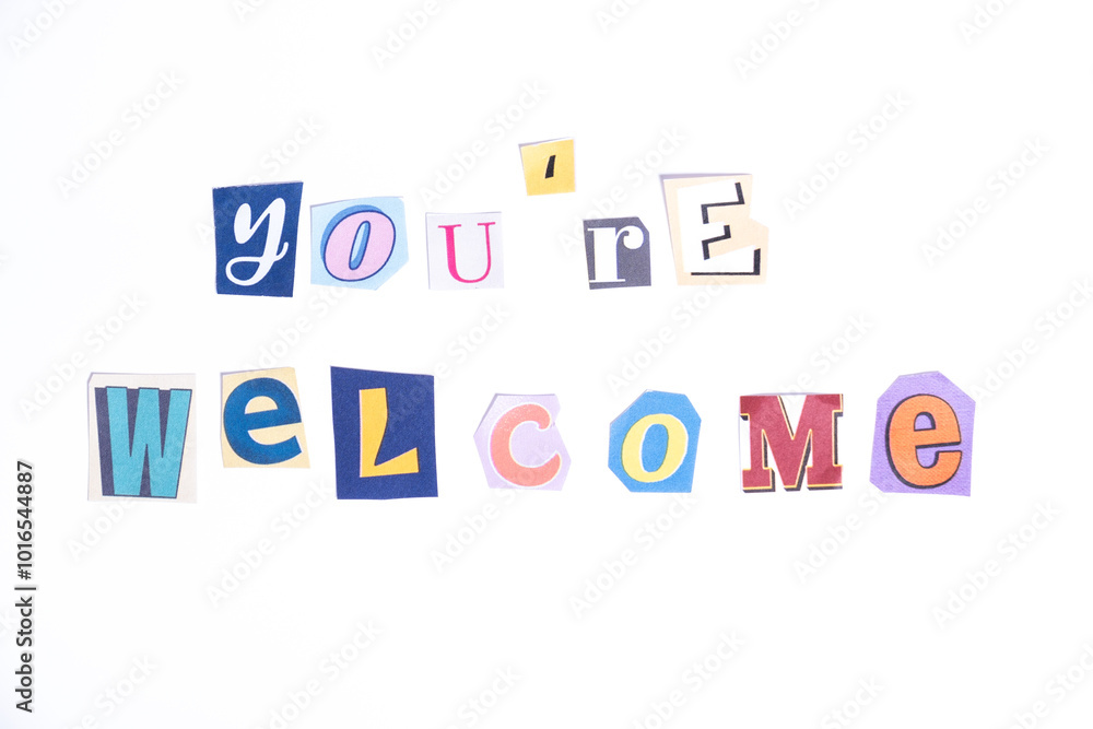 Welcome symbol. Concept words You're Welcome isolated on clean white background in fun cut out newspaper style typescript. Welcome symbol. Concept words You're Welcome isolated on clean white background in fun cut out newspaper style typescript.