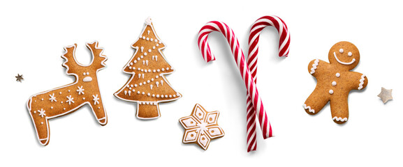 Christmas design element on transparent background with transparent shadow. Isolated Christmas sweet Candy Cane and gingerbread ginger men. Flat lay, top view