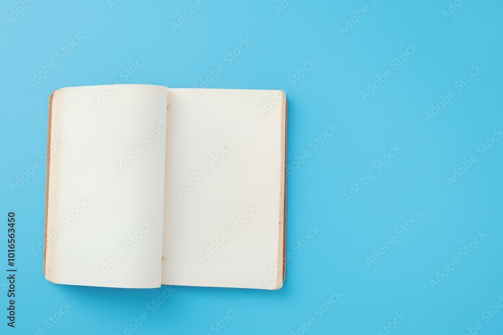 Open book on blue background with curled pages. White pages contrast with blue color, visually striking composition. Single copybook on college background, signs of wear. Empty notebook pages, text, Open book on blue background with curled pages. White pages contrast with blue color, visually striking composition. Single copybook on college background, signs of wear. Empty notebook pages, text,