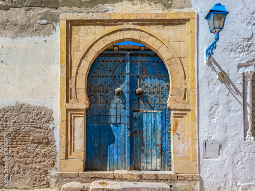 Typical Traditional door in wood decorated with nails