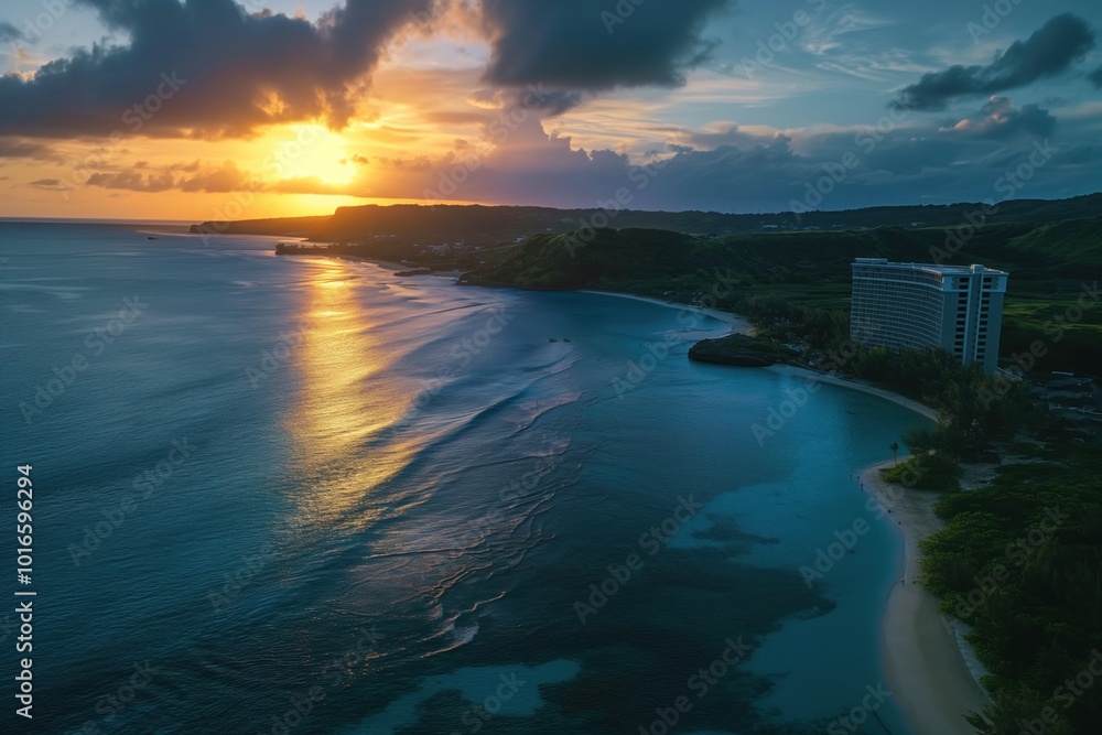 Fototapeta premium Serene beach scene with large white building blue roof on sandy shore. Few people walk along shoreline, surrounded by small trees. Blue sky with clouds, warm sun glow. Tropical paradise with calm